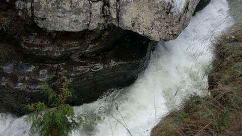 Water gushes down a hillside