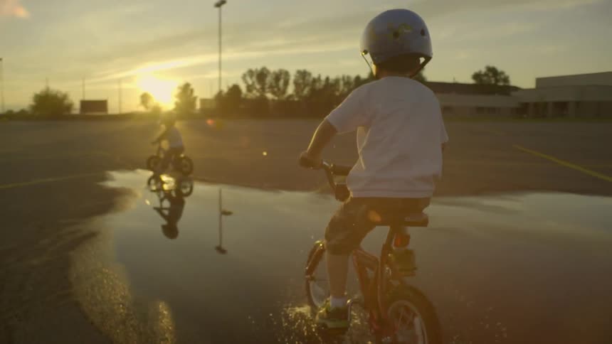 A child driving bike at the park