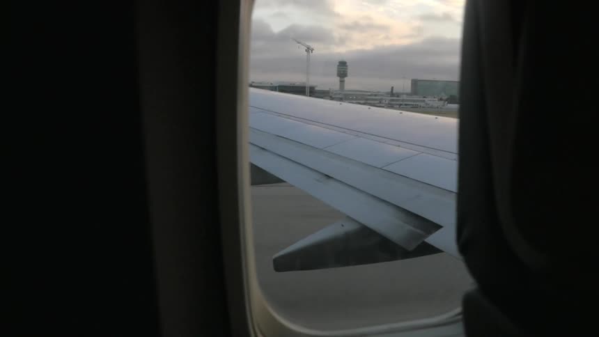 A jet begins its ascent on the runway