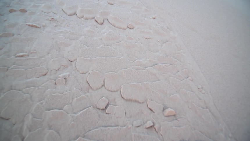 An aerial view of the sands on a beach