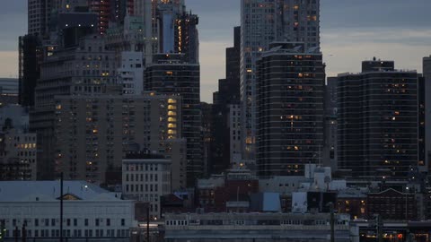 Skyscraper on city downtown skyline at sunset