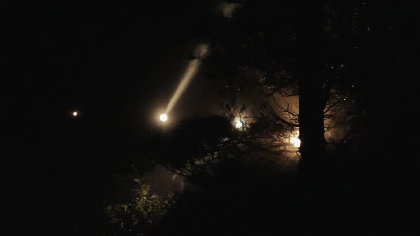 Beams of light illuminate the night
