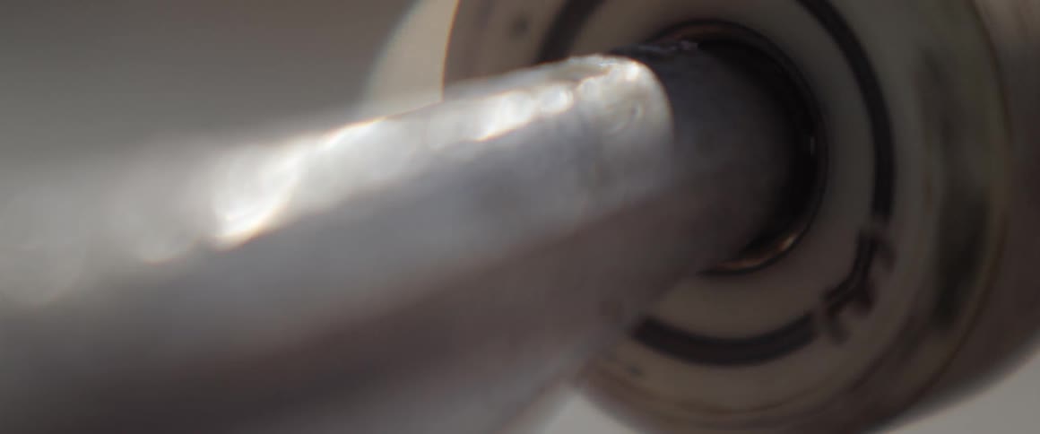 A turbine runs alongside a rod