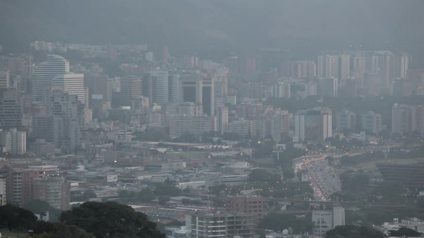 A city is bustling at night and into the morning