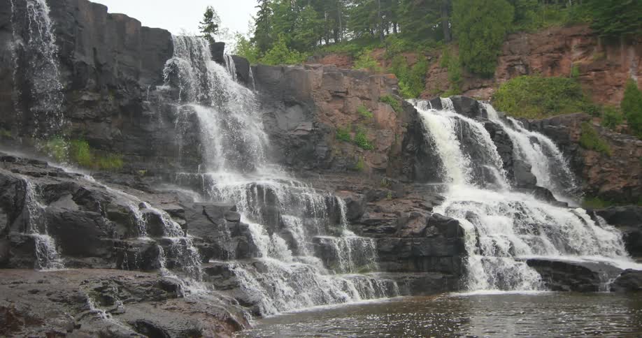 Several waterfalls flowing into the basin