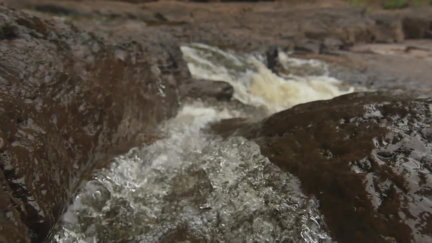 Water gushes down a stream