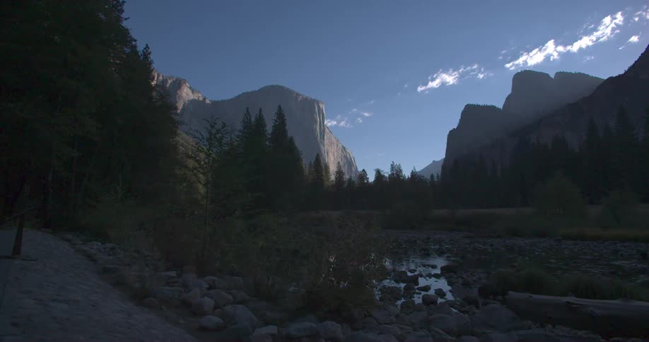 Mountains loom over a valley