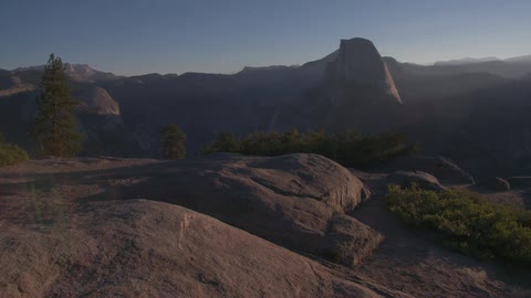 Boulders and mountainside in the daytime