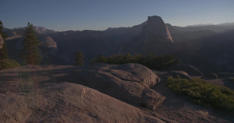 Boulders and mountainside in the daytime