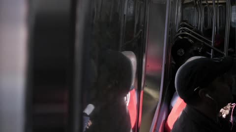People travelling in a commuter train