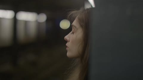 A person waiting at a train station