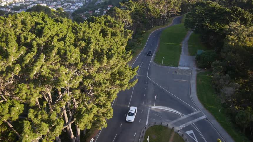 Aerial view of roads near a coastal city