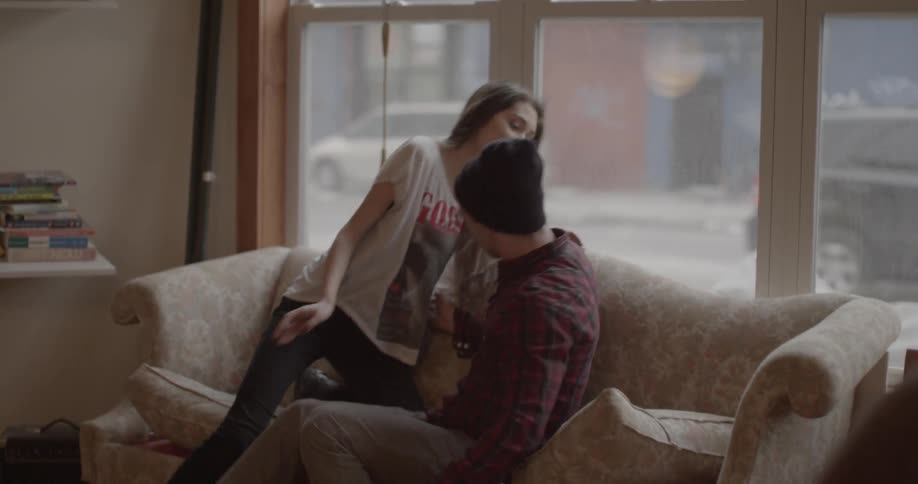 A man is smiling at a woman