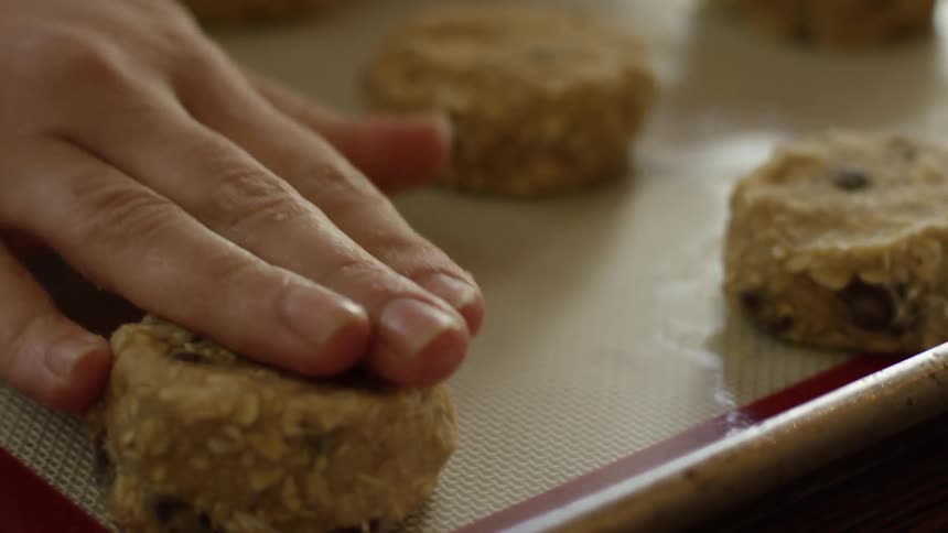 Cookie dough is placed on a pan to bake