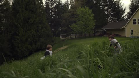Children are playing in a field