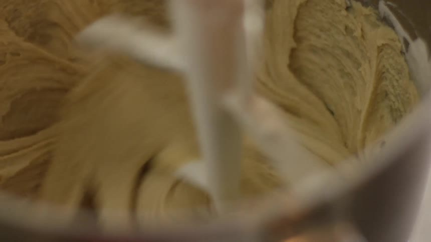 Batter is mixed by a stand mixer