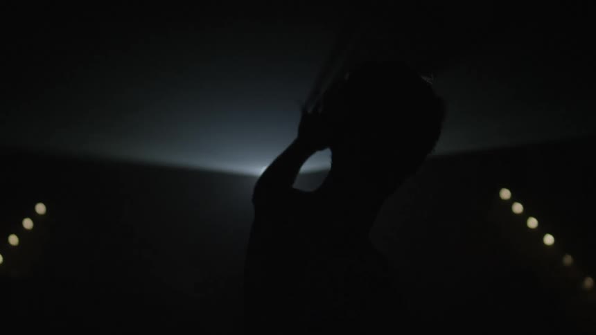 A person holding up their hand