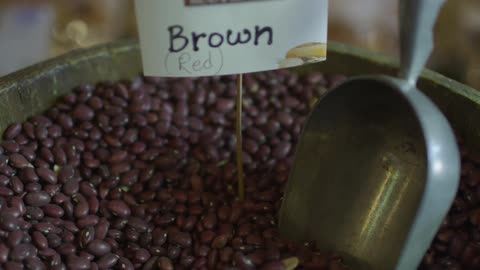 A container of bulk sale beans