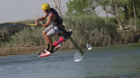 A man doing extreme sport at the river