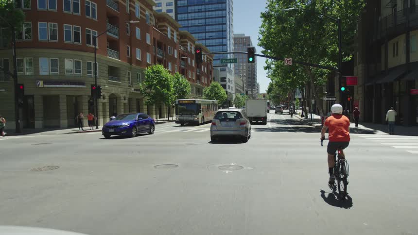 A view of the street and traffic in an urban setting