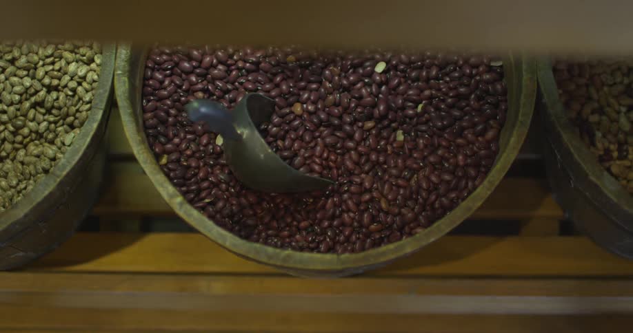 Bins of beans sit undisturbed