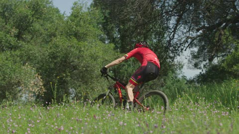 A person riding their bike
