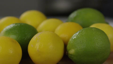 A mist falls on limes and lemons